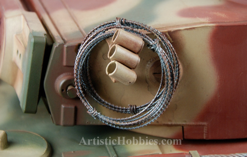 Barbed wire hanging on the side of the Tiger i turret